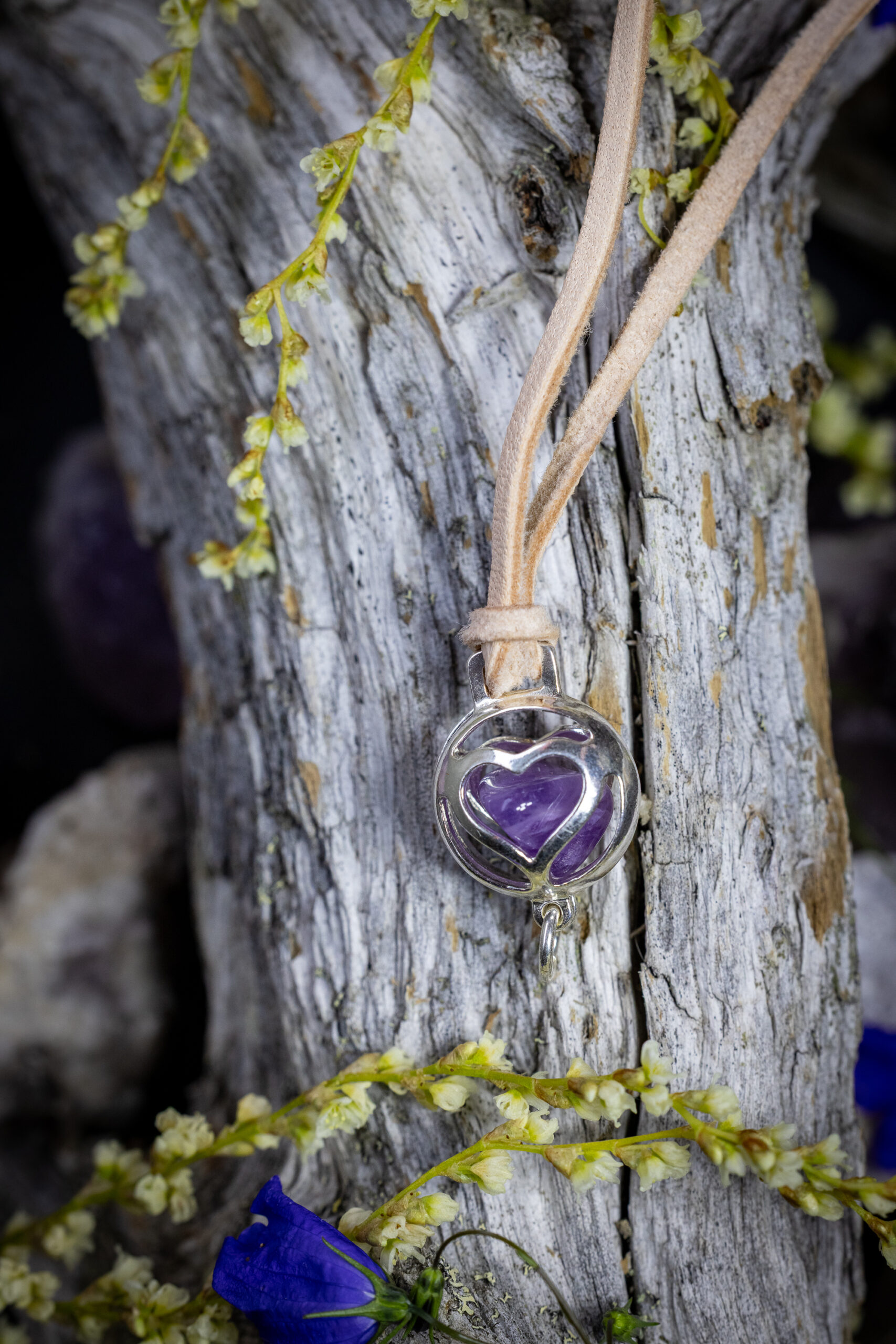 Treasure amethyst pendant in leather band, small